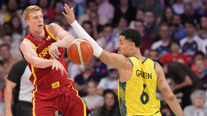 Jul 27, 2024; Villeneuve-d'Ascq, France; Spain point guard Alberto Diaz (9) passes the ball away from Australia small forward Josh Green (6) in men's Group A play during the Paris 2024 Olympic Summer Games at Stade Pierre-Mauroy. Mandatory Credit: John David Mercer-USA TODAY Sports Jul 27, 2024; Villeneuve-d'Ascq, France; Spain point guard Alberto Diaz (9) passes the ball away from Australia small forward Josh Green (6) in men's Group A play during the Paris 2024 Olympic Summer Games at Stade Pierre-Mauroy. Mandatory Credit: John David Mercer-USA TODAY Sports