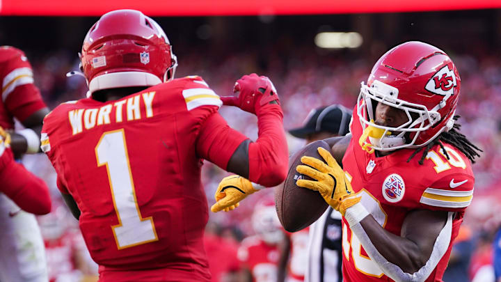 Sep 28, 2025; Kansas City, Missouri, USA; Kansas City Chiefs running back Isiah Pacheco (10) celebrates with Kansas City Chiefs wide receiver Xavier Worthy (1) after scoring a touchdown during the first half against the Baltimore Ravens at GEHA Field at Arrowhead Stadium. Mandatory Credit: Denny Medley-Imagn Images