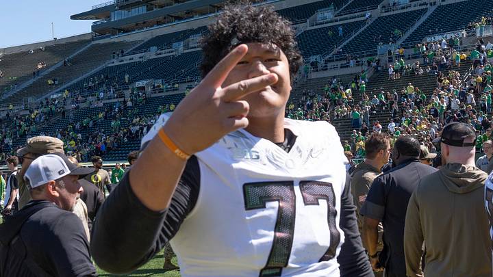 Oregon’s Tommy Tofi leaves the field after the Oregon Spring Game at Autzen Stadium in Eugene April 25, 2026