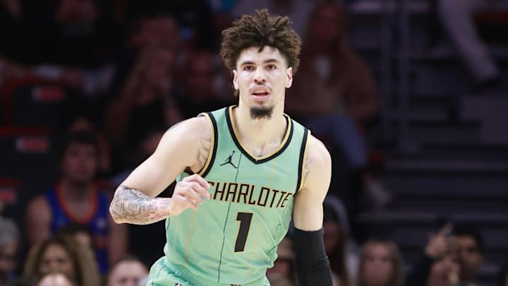 Mar 23, 2025; Miami, Florida, USA;  Charlotte Hornets guard LaMelo Ball (1) brings the ball up court against the Miam Heat during the first half at Kaseya Center. Mandatory Credit: Rhona Wise-Imagn Images