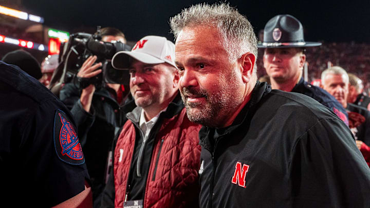 Coach Matt Rhule, right, and Athletic Director Troy Dannen walk off the field after the Huskers' 2024 win over Wisconsin. Coach Matt Rhule, right, and Athletic Director Troy Dannen walk off the field after the Huskers' 2024 win over Wisconsin.