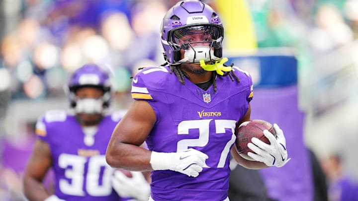 Oct 19, 2025; Minneapolis, Minnesota, USA; Minnesota Vikings running back Jordan Mason (27) warms up before the game against the Philadelphia Eagles at U.S. Bank Stadium. 