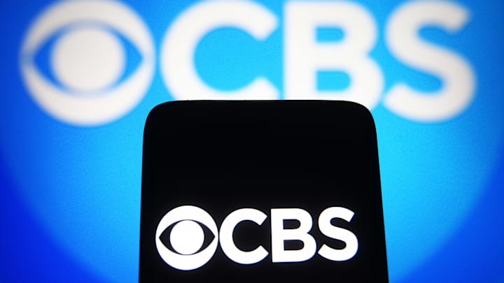 In this photo illustration, a CBS logo of a commercial...