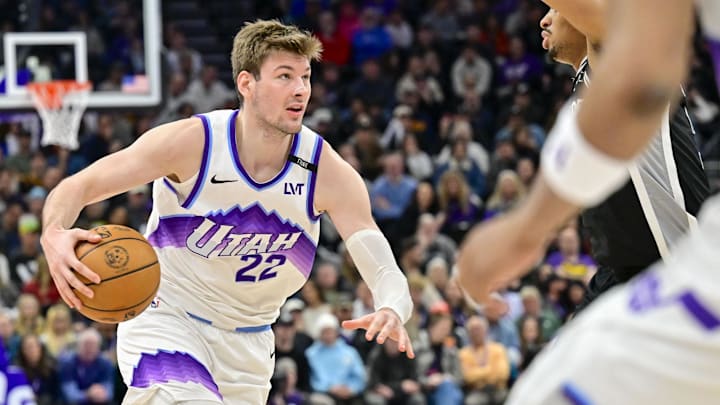 Jan 22, 2026; Salt Lake City, Utah, USA; Utah Jazz center Kyle Filipowski (22) dribbles during the second half against the San Antonio Spurs at Delta Center. Mandatory Credit: Peter Creveling-Imagn Images