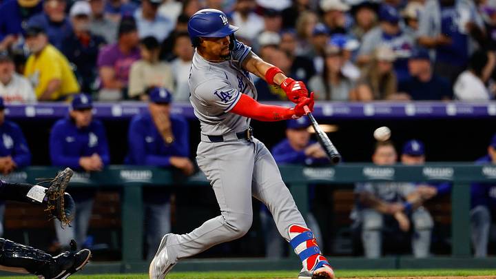 Apr 20, 2026; Denver, Colorado, USA; Los Angeles Dodgers second baseman Santiago Espinal (21) hits a single in the fourth inning against the Colorado Rockies at Coors Field. Mandatory Credit: Isaiah J. Downing-Imagn Images Apr 20, 2026; Denver, Colorado, USA; Los Angeles Dodgers second baseman Santiago Espinal (21) hits a single in the fourth inning against the Colorado Rockies at Coors Field. Mandatory Credit: Isaiah J. Downing-Imagn Images