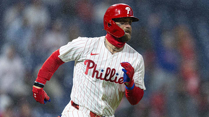 Apr 2, 2024; Philadelphia, Pennsylvania, USA; Philadelphia Phillies first baseman Bryce Harper (3) runs the bases after hitting his second home run of the game during the fourth inning against the Cincinnati Reds at Citizens Bank Park.