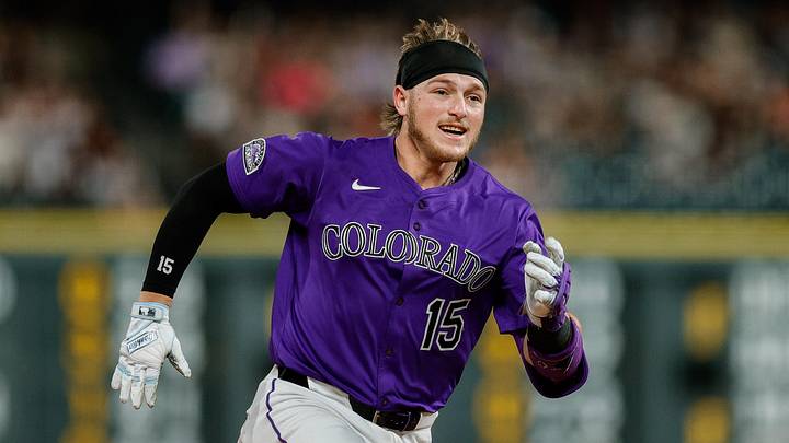 Jun 10, 2025; Denver, Colorado, USA; Colorado Rockies catcher Hunter Goodman (15) runs to third on a triple in the eighth inning against the San Francisco Giants at Coors Field. 