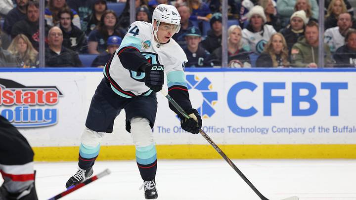 Mar 28, 2026; Buffalo, New York, USA;  Seattle Kraken right wing Kaapo Kakko (84) makes a pass during the first period against the Buffalo Sabres at KeyBank Center. Mandatory Credit: Timothy T. Ludwig-Imagn Images