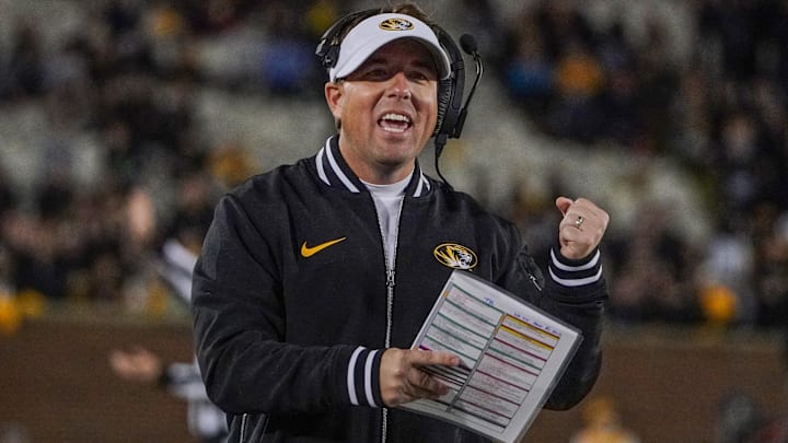 Nov 18, 2023; Columbia, Missouri, USA; Missouri Tigers head coach Eli Drinkwitz reacts to a play against the Florida Gators during the first half at Faurot Field at Memorial Stadium. Mandatory Credit: Denny Medley-Imagn Images