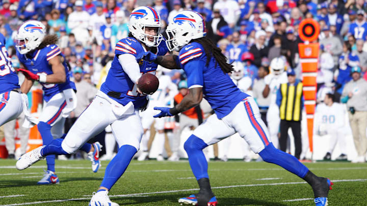 Buffalo Bills QB Josh Allen hands off the ball to Buffalo Bills RB James Cook against the Miami Dolphins. Buffalo Bills QB Josh Allen hands off the ball to Buffalo Bills RB James Cook against the Miami Dolphins.