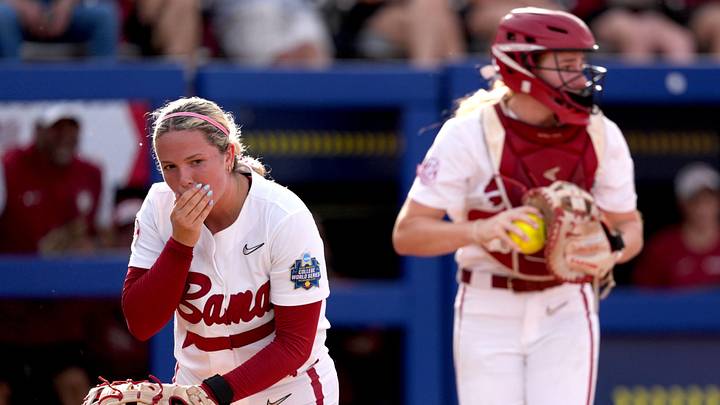 Alabama's Brooke Wells (15) reacts after a collision with Marlie Giles (34) during a Women's College World Series softball game between the Alabama Crimson Tide and the UCLA Bruins at Devon Park in Oklahoma City, May 28, 2026. Alabama's Brooke Wells (15) reacts after a collision with Marlie Giles (34) during a Women's College World Series softball game between the Alabama Crimson Tide and the UCLA Bruins at Devon Park in Oklahoma City, May 28, 2026.