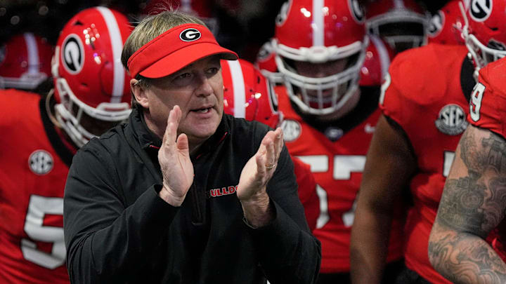 Georgia coach Kirby Smart takes the field with his team before the start of the SEC championship game against Texas in Atlanta, on Saturday, Dec. 7, 2024.