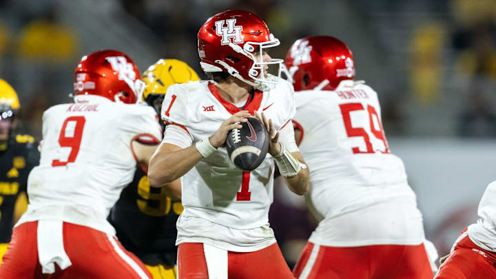 Oct 25, 2025; Tempe, Arizona, USA; Houston Cougars quarterback Conner Weigman (1) against the Arizona State Sun Devils in the second half at Mountain America Stadium. Mandatory Credit: Mark J. Rebilas-Imagn Images