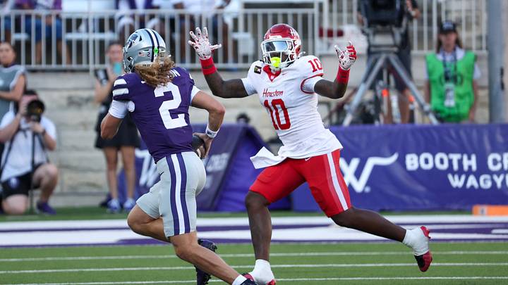 Oct 10, 2026; Manhattan, Kansas, USA; Houston Cougars defensive end Latreveon McCutchin (10) chases Kansas State Wildcats quarterback Avery Johnson (2) during the third quarter at Bill Snyder Family Football Stadium. Mandatory Credit: Scott Sewell-Imagn Images Oct 10, 2026; Manhattan, Kansas, USA; Houston Cougars defensive end Latreveon McCutchin (10) chases Kansas State Wildcats quarterback Avery Johnson (2) during the third quarter at Bill Snyder Family Football Stadium. Mandatory Credit: Scott Sewell-Imagn Images