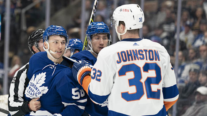 Apr 17, 2022; Toronto, Ontario, CAN; Toronto Maple Leafs left wing Michael Bunting (58) battles with Apr 17, 2022; Toronto, Ontario, CAN; Toronto Maple Leafs left wing Michael Bunting (58) battles with