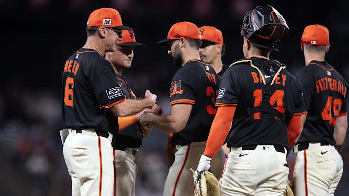 Mar 24, 2025; San Francisco, California, USA; San Francisco Giants manager Bob Melvin (6) takes the ball from starting pitcher Robbie Ray (38) during the sixth inning against the Detroit Tigers at Oracle Park.