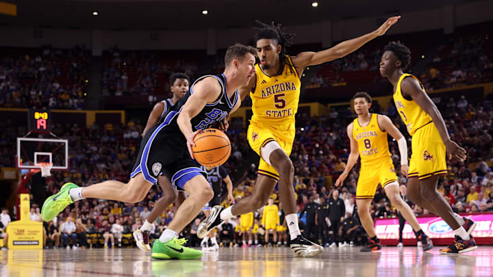 Arizona State's Amier Ali defends against BYU's Trevin Knell during the Sun Devils' 91-81 loss to the Cougars on Wednesday, Feb. 26, 2025.