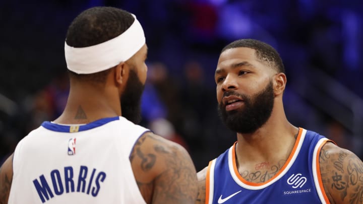 Knicks forward Marcus Morris Sr. and Pistons forward Markieff Morris shake hands after a game in 2019.