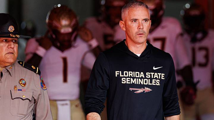 Nov 29, 2025; Gainesville, Florida, USA; Florida State Seminoles head coach Mike Norvell walks out of the tunnel before a game against the Florida Gators at Ben Hill Griffin Stadium. Mandatory Credit: Matt Pendleton-Imagn Images
