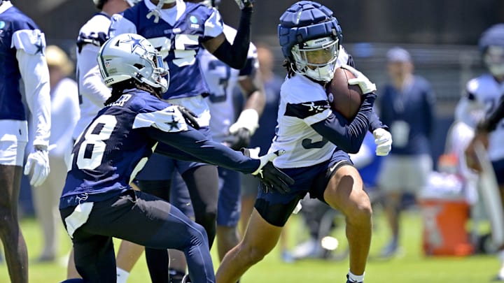 Jul 26, 2023; Oxnard, CA, USA; Dallas Cowboys running back Ronald Jones (32) carries the ball during