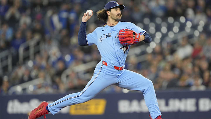 Toronto Blue Jays starting pitcher Dylan Cease (84) pitches to the Los Angeles Dodgers. 