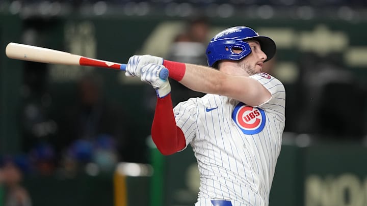 Mar 15, 2025; Bunkyo, Tokyo, Japan; Chicago Cubs right fielder Kyle Tucker (30) bats against the Hanshin Tigers during the seventh inning at Tokyo Dome.