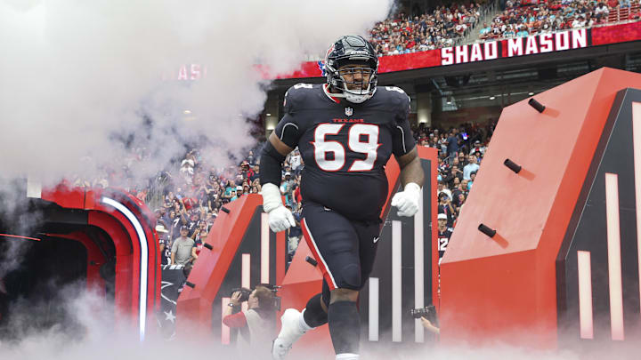 Dec 15, 2024; Houston Texans guard Shaq Mason (69) runs onto the field before the game against the Miami Dolphins at NRG Stadium. Mandatory Credit: Troy Taormina-Imagn Images