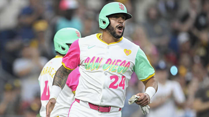 San Diego Padres third baseman Donovan Solano celebrates after scoring against the Arizona Diamondbacks on July 5 at T-Mobile Park.