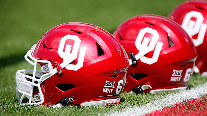 Sooner helmets on the ground during the Oklahoma Spring Game.