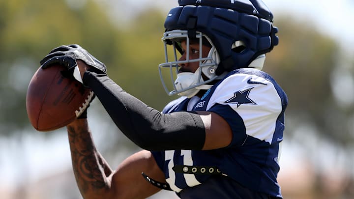 Dallas Cowboys cornerback Josh Butler makes a catch during training camp at the River Ridge Playing Fields in Oxnard Dallas Cowboys cornerback Josh Butler makes a catch during training camp at the River Ridge Playing Fields in Oxnard