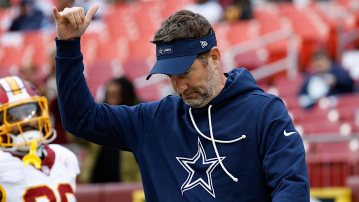Dallas Cowboys head coach Brian Schottenheimer looks on during warmups before the game against the Washington Commanders.