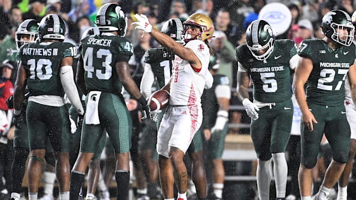 Sep 21, 2024; Chestnut Hill, Massachusetts, USA; Boston College Eagles wide receiver Lewis Bond (11) reacts to his first down run during the first half against the Michigan State Spartans at Alumni Stadium. Mandatory Credit: Eric Canha-Imagn Images