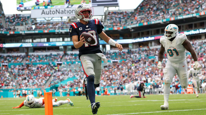 New England Patriots quarterback Drake Maye (10) runs into the end zone for a touchdown against the Miami Dolphins in the third quarter at Hard Rock Stadium in Week 2 this season.