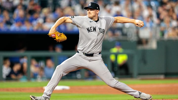 Jun 11, 2025; Kansas City, Missouri, USA; New York Yankees pitcher Brent Headrick (47) pitches during the eighth inning against the Kansas City Royals  at Kauffman Stadium. Mandatory Credit: William Purnell-Imagn Images
