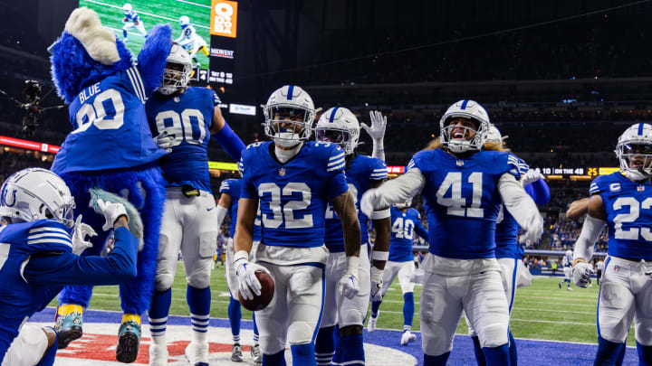 Dec 16, 2023; Indianapolis, Indiana, USA; Indianapolis Colts safety Julian Blackmon (32) celebrates his interception with teammates in the second half against the Pittsburgh Steelers at Lucas Oil Stadium. 