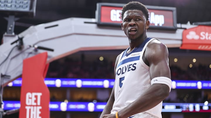 Feb 21, 2025; Houston, Texas, USA; Minnesota Timberwolves guard Anthony Edwards (5) reacts after scoring a basket during the second quarter against the Houston Rockets at Toyota Center.