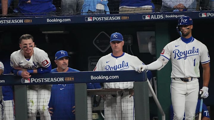 Oct 10, 2024; Kansas City, Missouri, USA; Kansas City Royals manager Matt Quatraro (33), outfielder MJ Melendez (1) and shortstop Bobby Witt Jr. (7) watch play from the dugout during the ninth inning against the New York Yankees during game four of the ALDS for the 2024 MLB Playoffs at Kauffman Stadium. Mandatory Credit: Denny Medley-Imagn Images Oct 10, 2024; Kansas City, Missouri, USA; Kansas City Royals manager Matt Quatraro (33), outfielder MJ Melendez (1) and shortstop Bobby Witt Jr. (7) watch play from the dugout during the ninth inning against the New York Yankees during game four of the ALDS for the 2024 MLB Playoffs at Kauffman Stadium. Mandatory Credit: Denny Medley-Imagn Images