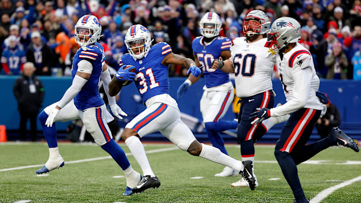 Buffalo Bills cornerback Rasul Douglas (31) scores on this interception against New England. It was Douglas s second interception of the game. The Bills beat the Patriots 27-21. Buffalo Bills cornerback Rasul Douglas (31) scores on this interception against New England. It was Douglas s second interception of the game. The Bills beat the Patriots 27-21.