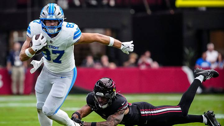 Detroit Lions tight end Sam Laporta (87) breaks a tackle from Cardinals defensive back Wydett Williams Jr. (31) Arizona Cardinals during a game at State Farm Stadium in Glendale on Oct. 11, 2026. Detroit Lions tight end Sam Laporta (87) breaks a tackle from Cardinals defensive back Wydett Williams Jr. (31) Arizona Cardinals during a game at State Farm Stadium in Glendale on Oct. 11, 2026.