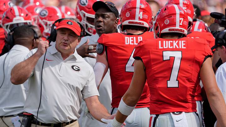 Georgia coach Kirby Smart celebrates with his team after a touchdown in 2025. Georgia coach Kirby Smart celebrates with his team after a touchdown in 2025.