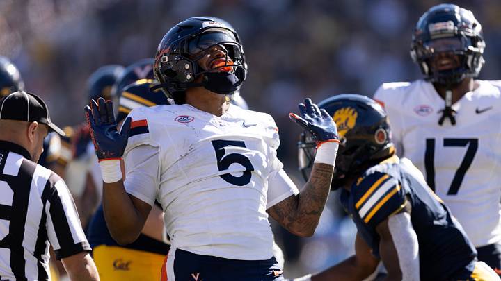 Nov 1, 2025; Berkeley, California, USA; Virginia Cavaliers linebacker Kam Robinson (5) reacts after sacking California Golden Bears quarterback Jaron-Keawe Sagapolutele (not pictured) during the second quarter at California Memorial Stadium. Mandatory Credit: D. Ross Cameron-Imagn Images Nov 1, 2025; Berkeley, California, USA; Virginia Cavaliers linebacker Kam Robinson (5) reacts after sacking California Golden Bears quarterback Jaron-Keawe Sagapolutele (not pictured) during the second quarter at California Memorial Stadium. Mandatory Credit: D. Ross Cameron-Imagn Images