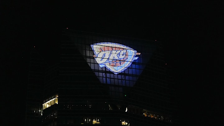 Devon Tower displays a Thunder logo in in Oklahoma City after game 6 of the NBA Finals, on Thursday, June 19, 2025.