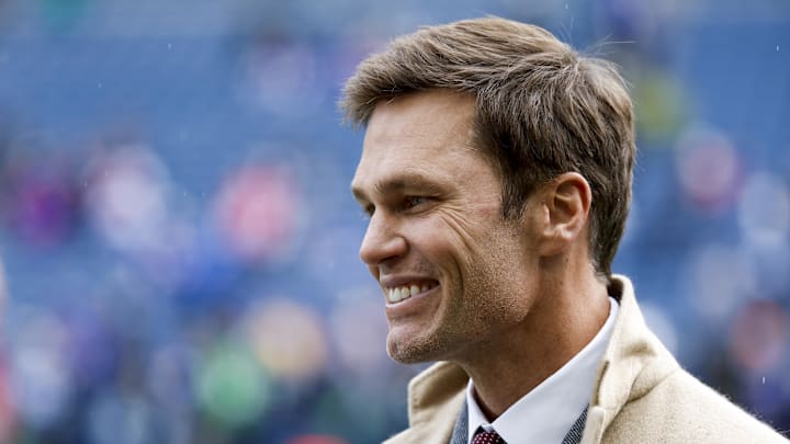FOX commentator Tom Brady stands on the sideline before a game between the Seattle Seahawks and Buffalo Bills at Lumen Field.