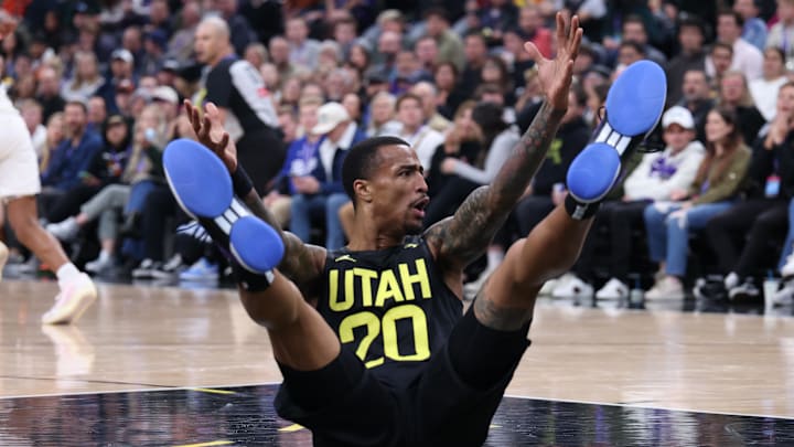 Oct 31, 2024; Salt Lake City, Utah, USA; Utah Jazz forward John Collins (20) reacts to a play against the San Antonio Spurs during the third quarter at Delta Center. Mandatory Credit: Rob Gray-Imagn Images