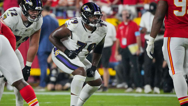 Sep 5, 2024; Kansas City, Missouri, USA; Baltimore Ravens offensive tackle Ronnie Stanley (79) at the line of scrimmage against the Kansas City Chiefs during the game at GEHA Field at Arrowhead Stadium. Mandatory Credit: Denny Medley-Imagn Images
