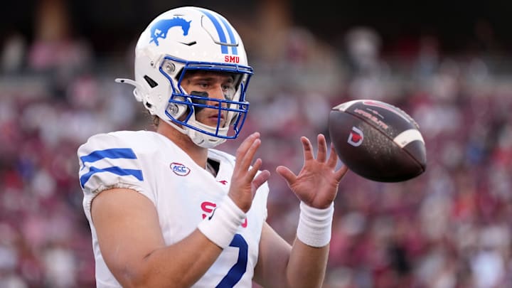 Oct 19, 2024; Stanford, California, USA; Southern Methodist Mustangs quarterback Preston Stone (2) warms up during the first quarter against the Stanford Cardinal at Stanford Stadium. Mandatory Credit: Darren Yamashita-Imagn Images