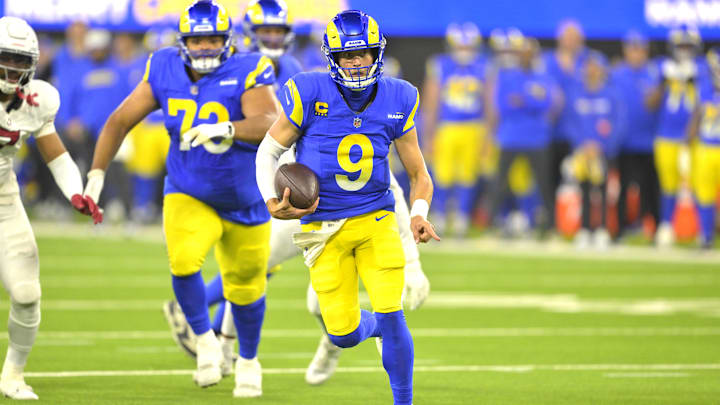 Dec 28, 2024; Inglewood, California, USA; Los Angeles Rams quarterback Matthew Stafford (9) carries the ball to the 5-yard line in the first half against the Arizona Cardinals at SoFi Stadium. Dec 28, 2024; Inglewood, California, USA; Los Angeles Rams quarterback Matthew Stafford (9) carries the ball to the 5-yard line in the first half against the Arizona Cardinals at SoFi Stadium.