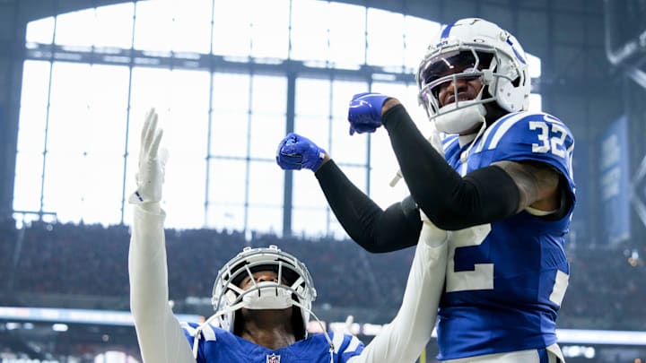 Indianapolis Colts safety Julian Blackmon (32) celebrates with Indianapolis Colts cornerback Jaylon Jones (40) and Jones’ interception Sunday, Sept. 22, 2024, during a game against the Chicago Bears at Lucas Oil Stadium in Indianapolis.