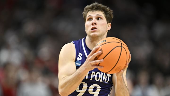 Mar 19, 2026; Portland, OR, USA; High Point Panthers guard Chase Johnston (99) controls the ball against the Wisconsin Badgers during the second half of a first round game of the men's 2026 NCAA Tournament at Moda Center. Mandatory Credit: Craig Strobeck-Imagn Images Mar 19, 2026; Portland, OR, USA; High Point Panthers guard Chase Johnston (99) controls the ball against the Wisconsin Badgers during the second half of a first round game of the men's 2026 NCAA Tournament at Moda Center. Mandatory Credit: Craig Strobeck-Imagn Images