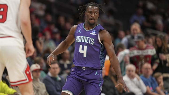 Dec 12, 2025; Charlotte, North Carolina, USA; Charlotte Hornets guard Sion James (4) brings the ball up court against the Chicago Bulls during the first quarter at Spectrum Center. Mandatory Credit: Jim Dedmon-Imagn Images Dec 12, 2025; Charlotte, North Carolina, USA; Charlotte Hornets guard Sion James (4) brings the ball up court against the Chicago Bulls during the first quarter at Spectrum Center. Mandatory Credit: Jim Dedmon-Imagn Images